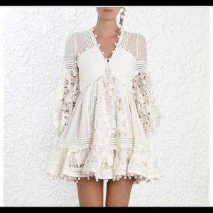 White long sleeve pompom dress.  Size L